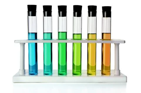 Colored liquids in six test tubes Foto stock