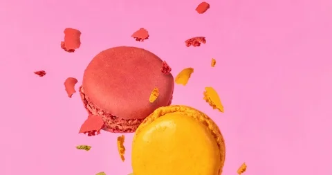 Colored macarons flying in freeze motion with motion slider effect Stock Footage 90021209