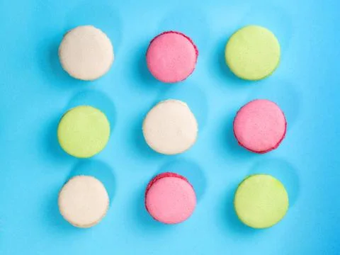 Colored macaroons on blue background Foto stock