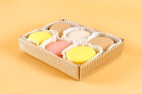Colored macaroons pack in cardboard box Stock-Fotos