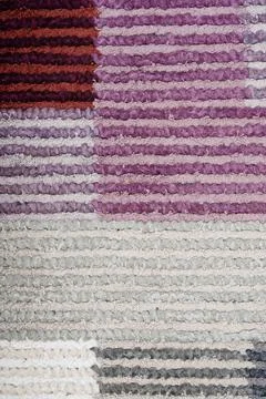 Colored machine carpet on a white background Foto stock