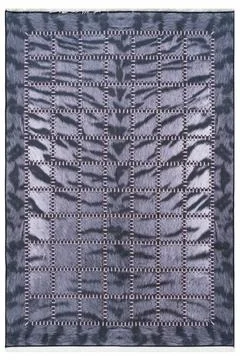 Colored machine carpet on a white background Foto stock