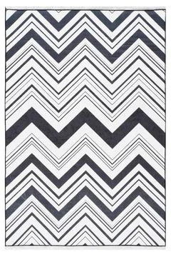 Colored machine carpet on a white background Stock Photos