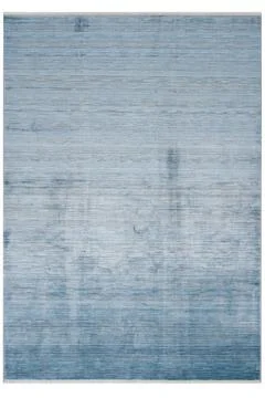 Colored machine carpets on a white background Stock Photos