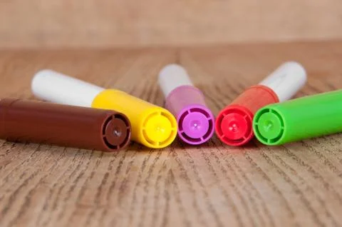 Colored markers on the table Stock Photos