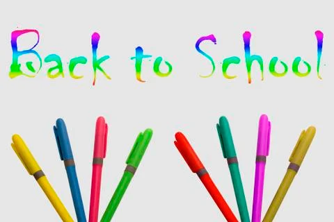 Colored markers on white background with a fun design Stock Photos
