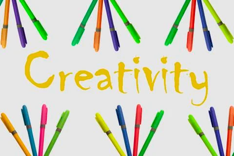 Colored markers on white background with a fun design Foto stock