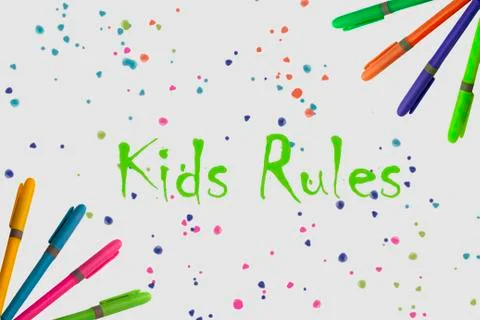 Colored markers on white background with a fun design Stock Photos