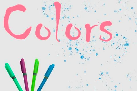 Colored markers on white background with a fun design Stock Photos