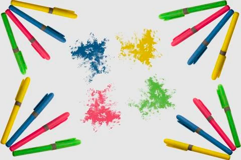 Colored markers on white background with a fun design Stock Photos
