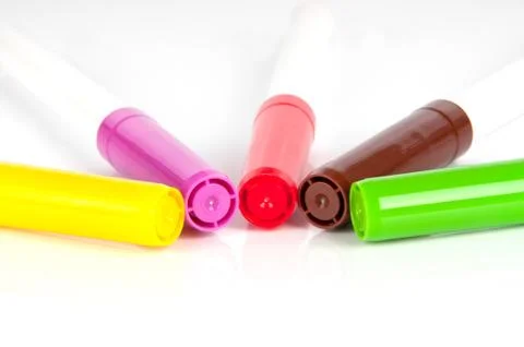 Colored markers on white background Stock Photos