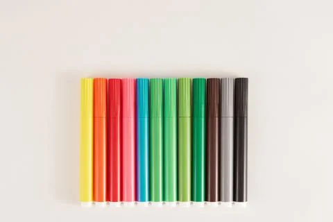 Colored markers on white background. Stock-Fotos