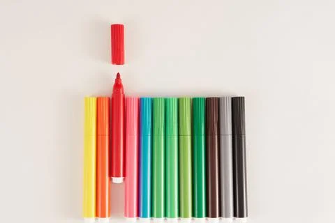 Colored markers on white background. Stock Photos