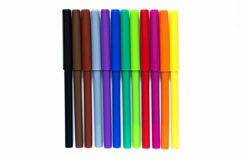 Colored markers on a white isolated background Stock Photos