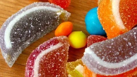Colored marmalade slices on the table Stock Photos