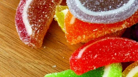 Colored marmalade slices on the table Stock Photos