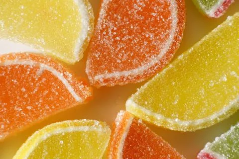 Colored marmalade on white background closeup. Stock Photos