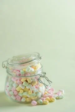 Colored marshmallow in a jar Stock Photos