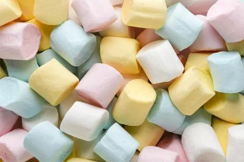 Colored marshmallows background. Top view Stock Photos