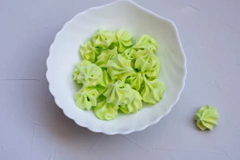 Colored meringue sweets, marshmallows, cake Stock Photos