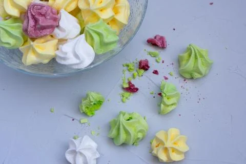 Colored meringue sweets, marshmallows, cake Stock Photos
