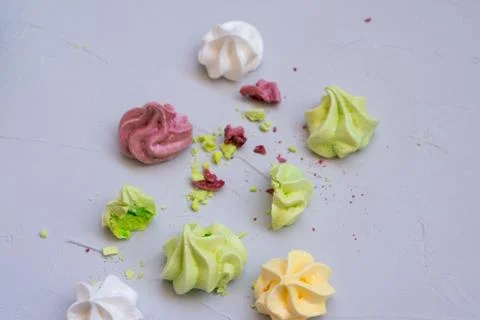 Colored meringue sweets, marshmallows, cake Stock Photos