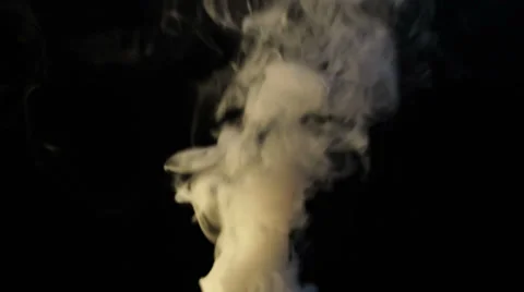 Colored moke on black background Видео 33863248