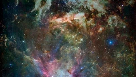 Colored nebula and open cluster of stars in the universe. Stock Photos