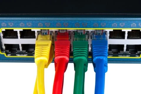 Colored Network Cables Connected to Switch Isolated Foto stock