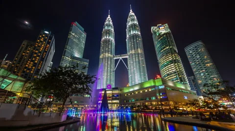 Colored night famous towers fountain 4k time lapse from kuala lumpur Stock Footage