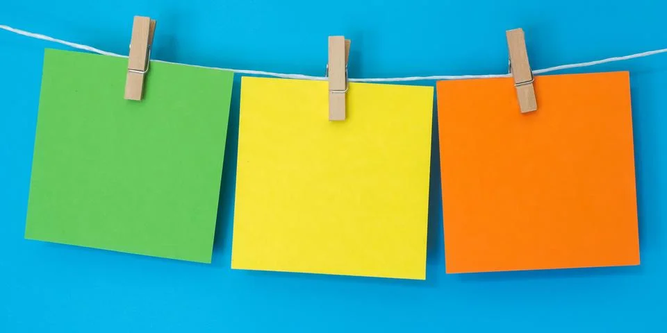 Colored Note Squares Hanging Stock Photos