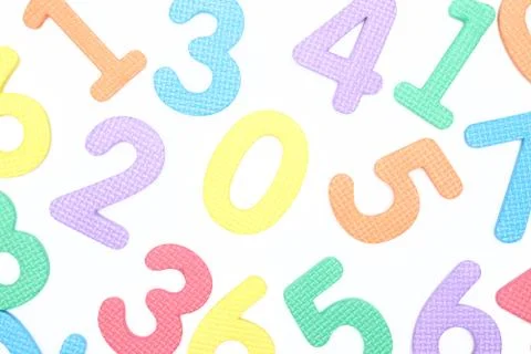 Colored numbers on white background. the concept of the school. the child lea Photos