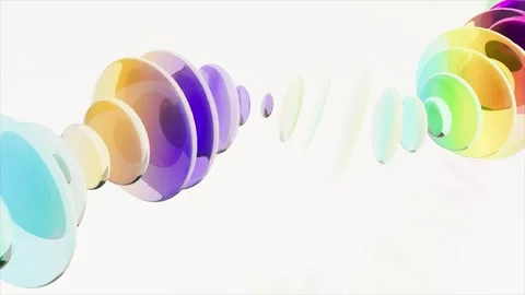Colored optics lenses on a white bg able to loop endless Stock Footage 325514559