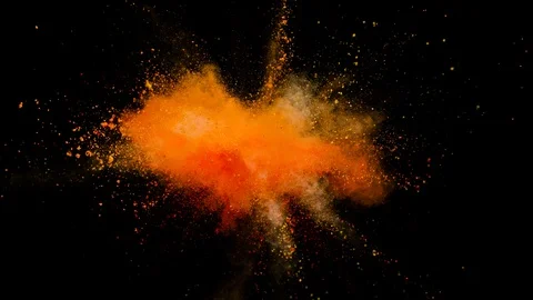 Colored orange powder explosion, abstract close up dust Stock Footage 122813393