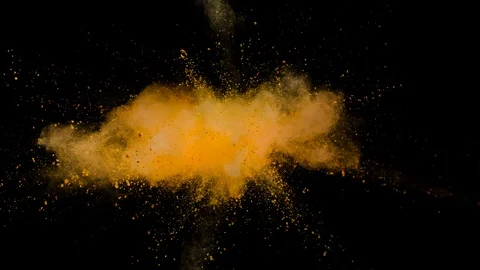 Colored orange powder explosion, abstract close up dust Stock Footage 122828370
