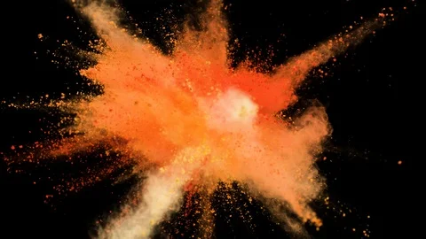 Colored orange powder explosion, abstract close up dust Stock Footage 122835448