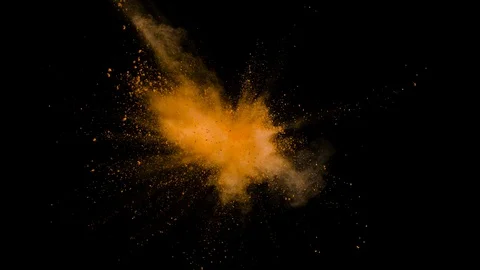 Colored orange powder explosion, abstract close up dust Stock Footage 122868380