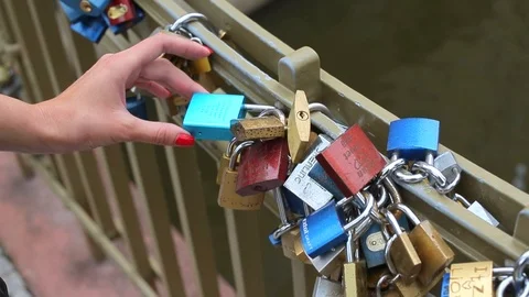 Colored padlocks on the bridge Stock Footage 93586133