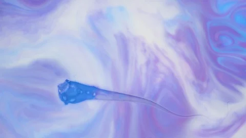 Colored paint beautiful spread in liquid, realtime shot Stock-Footage 100717725