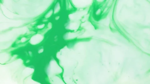 Colored paint beautiful spread in liquid, realtime shot Stock Footage 100718694