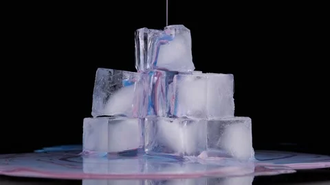 Colored paint spreads over the surface o... | Stock Video | Pond5