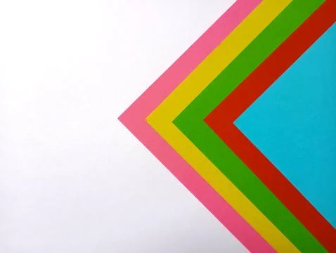 Colored paper background, top view. Stock Photos