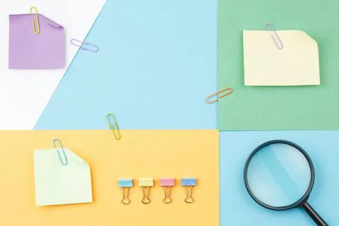 Colored paper with binders and note paper Stock Photos