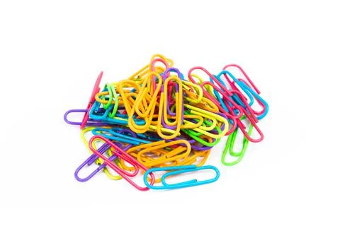Colored paper clips isolated Stock Photos