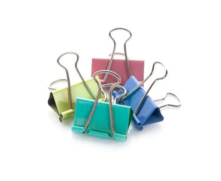 Colored paper clips on a white background Stock-Fotos