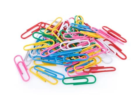 Colored paper clips on white background 库存照片
