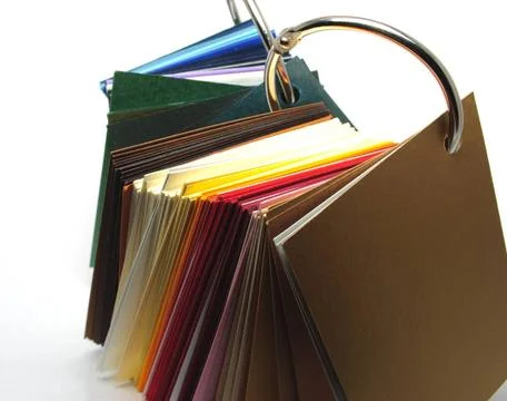 Colored paper Colored paper stack isolated on white background. Samples of... Stock Photos