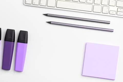 Colored paper with important message lying desk near keyboard. Main information Stock Photos