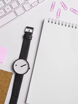 Colored paper with important message lying desk near keyboard. Main information Stock Photos