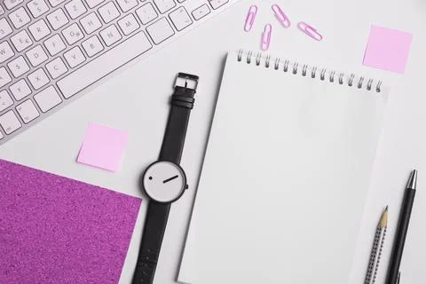 Colored paper with important message lying desk near keyboard. Main information Stock Photos